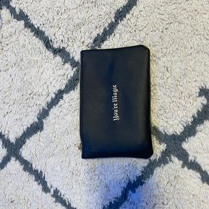 Black “your magic” makeup bag